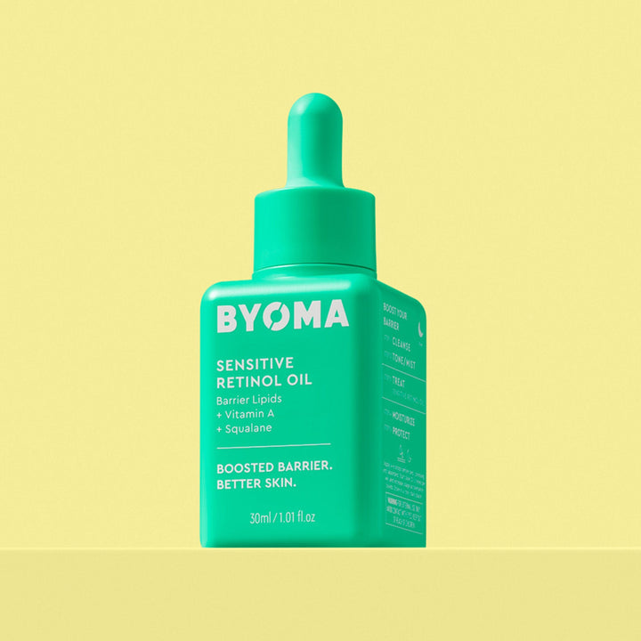 Une bouteille verte d'huile de rétinol sensible BYOMA avec un compte-gouttes.