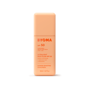 Une bouteille orange de crème solaire BYOMA Ultralight Face Fluid SPF 50.