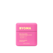 Conteneur de masque facial rose avec la marque « BYOMA » sur fond vert