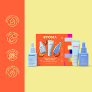 Ensemble de produits de soin BYOMA avec emballage sur fond jaune